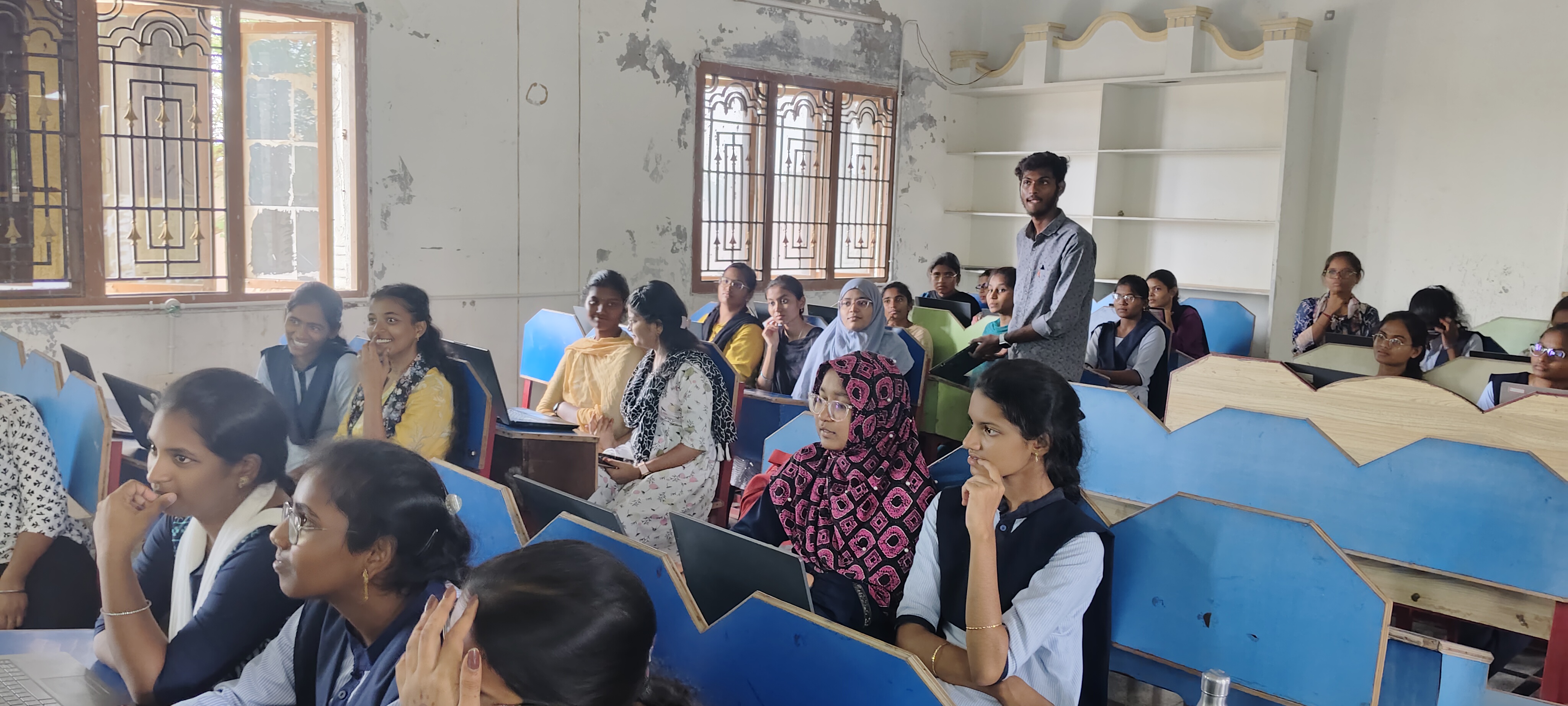 Engaged audience listening to architecture pitch